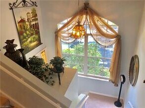 2460 Old Groves Rd-Unit -E-201 in Naples, FL - Foto de edificio - Building Photo