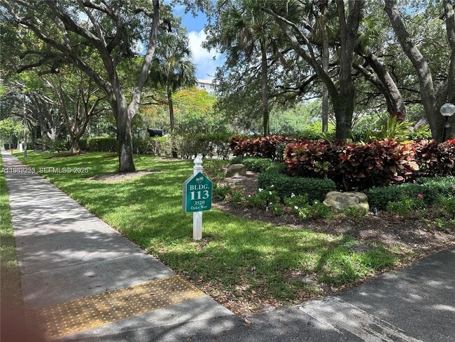 3520 Oaks Way, Unit 407 in Pompano Beach, FL - Building Photo - Building Photo