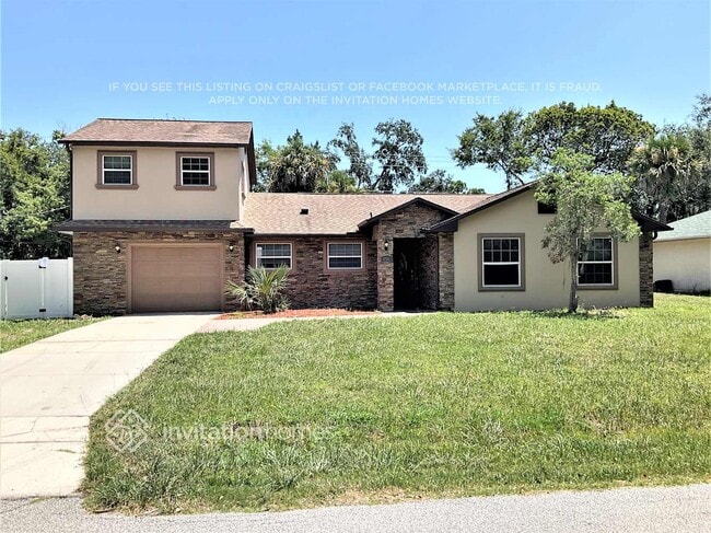 1725 Pine Tree Dr in Edgewater, FL - Building Photo - Building Photo