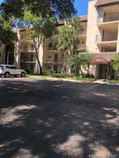 9450 Poinciana Pl-Unit -405 in Davie, FL - Building Photo