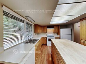 8702 61st St W in University Place, WA - Foto de edificio - Building Photo