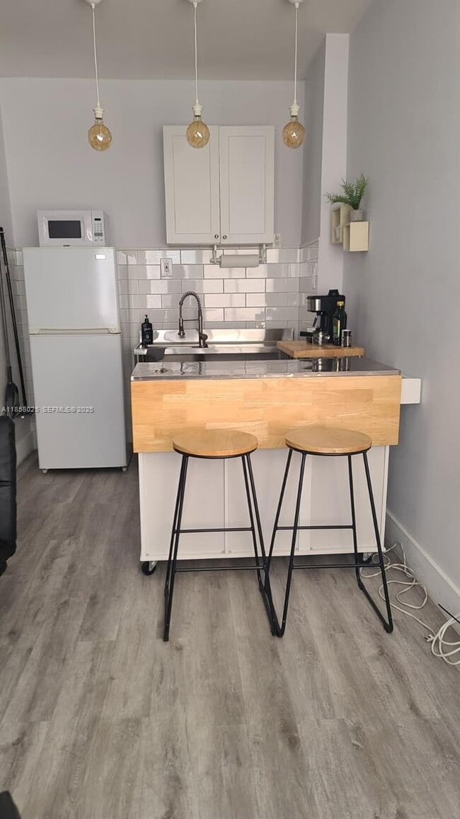 property at 3710 Collins Ave