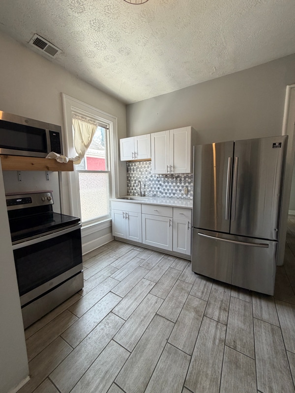 818 Oak St, Unit Apt 4 in Cincinnati, OH - Foto de edificio - Building Photo