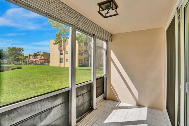 11453 NW 39th Ct, Unit 309-2 in Coral Springs, FL - Foto de edificio - Building Photo