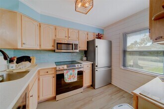 13827 Mission Oaks Blvd, Unit 10C in Seminole, FL - Building Photo - Building Photo