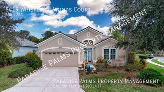 8419 Whispering Woods Ct in Lakewood Ranch, FL - Building Photo