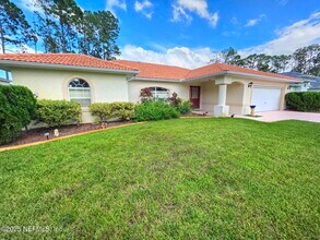 13 Edgewater Dr in Palm Coast, FL - Building Photo - Building Photo