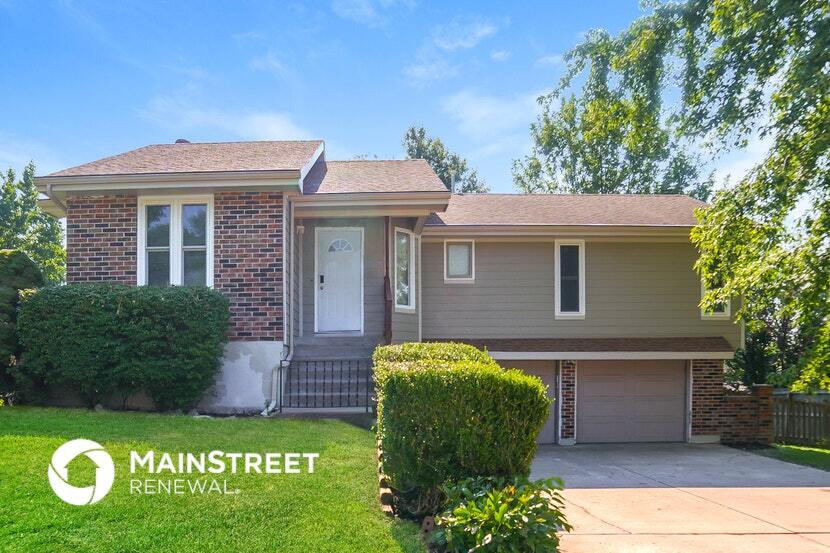 407 N Washington St in Raymore, MO - Building Photo