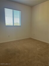 10100 Tin Maple Dr in Estero, FL - Building Photo - Building Photo