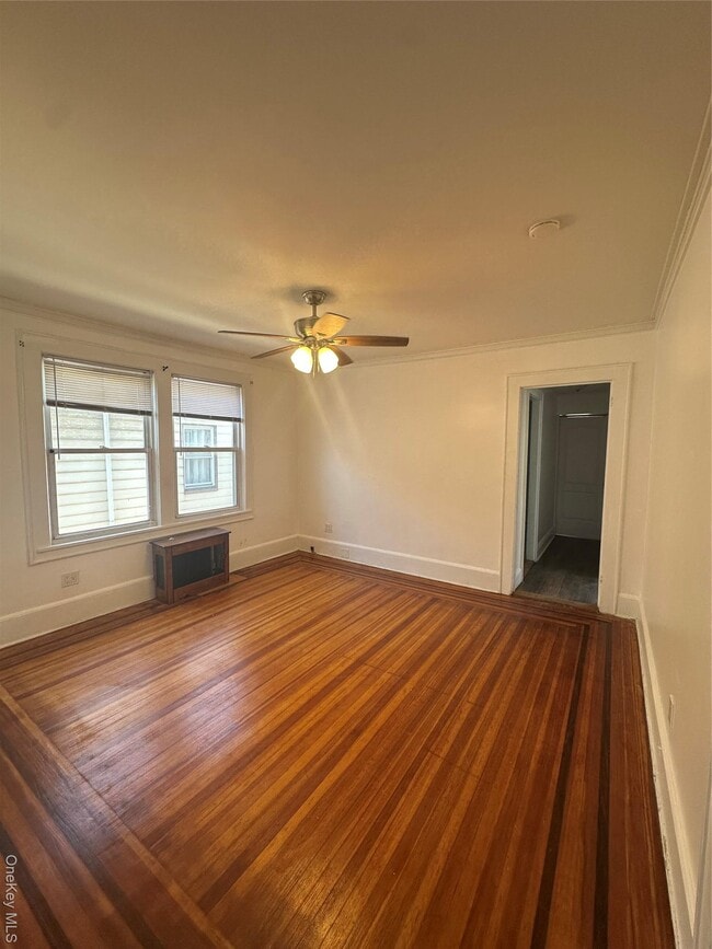 property at 69-29 Thursby Ave
