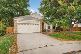 5241 Helena St, Unit 3-E-204 in Denver, CO - Building Photo - Building Photo