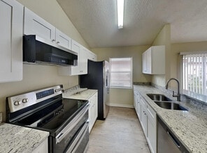 3651 SW Voyager St in Port St. Lucie, FL - Building Photo - Building Photo