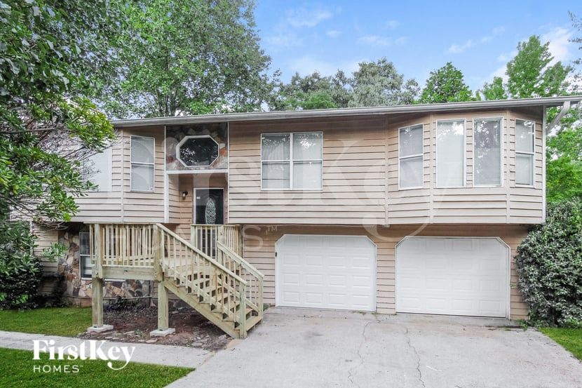 634 Woodsong Ln in Stone Mountain, GA - Foto de edificio