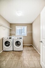 2128 Luxstone Blvd SW in Airdrie, AB - Building Photo - Building Photo
