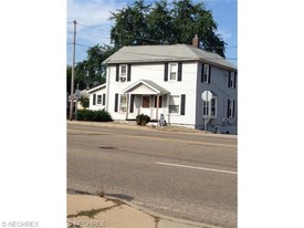 13003 Cleveland Ave NW in Uniontown, OH - Foto de edificio - Building Photo