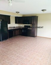 405 S Darrowby Dr in Raymore, MO - Building Photo - Building Photo