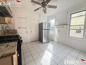 97 Franklin St, Unit 1 in Boston, MA - Building Photo - Building Photo