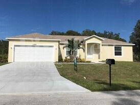 11986 Booth Ave in Port Charlotte, FL - Building Photo