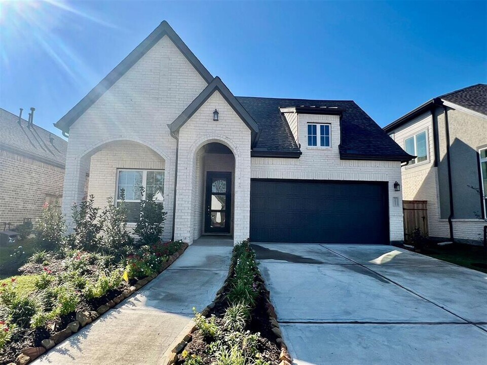 10642 Blossom Bend Ln in Sienna Plantation, TX - Building Photo