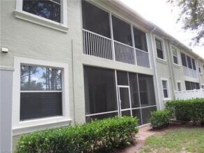 1435 Mariposa Cir-Unit -104 in Naples, FL - Building Photo - Building Photo