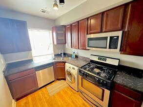 40 N Menard Ave, Unit 01A in Chicago, IL - Foto de edificio - Building Photo