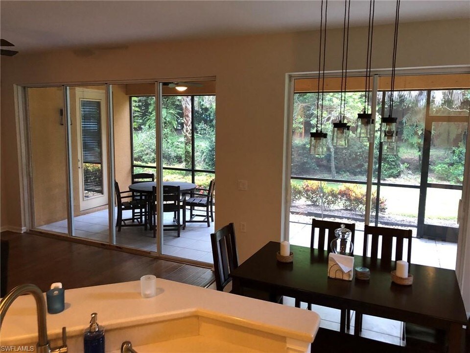 10030 Valiant Ct-Unit -102 in Miromar Lakes, FL - Building Photo