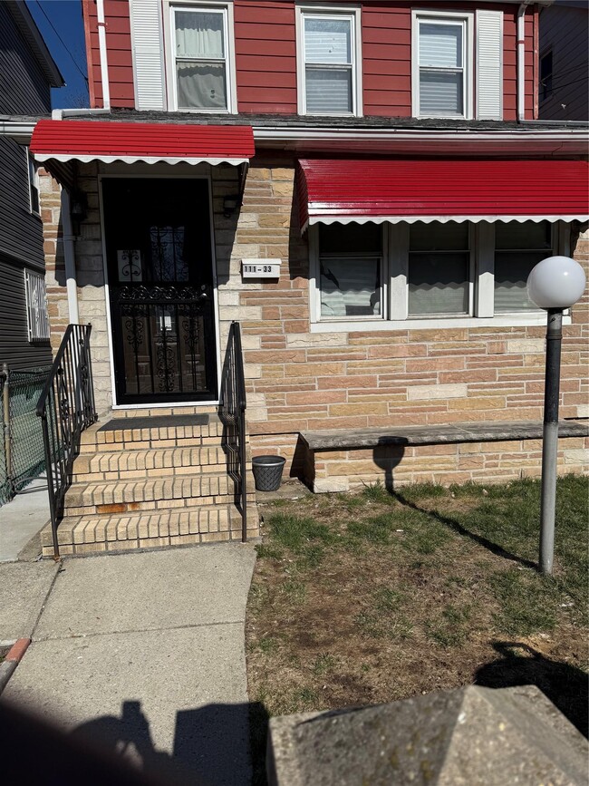property at 111-33 208th St