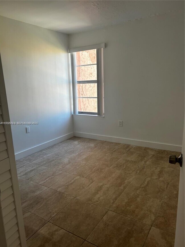 property at 4717 NW 7th St