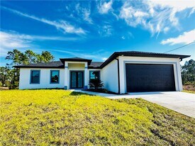 717 Genoa Ave S in Lehigh Acres, FL - Building Photo