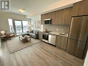 7437 Kingston Rd in Toronto, ON - Building Photo - Building Photo