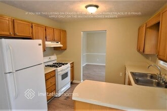 1310 Creekwood Cove, Unit 406 in Lawrenceville, GA - Building Photo - Building Photo
