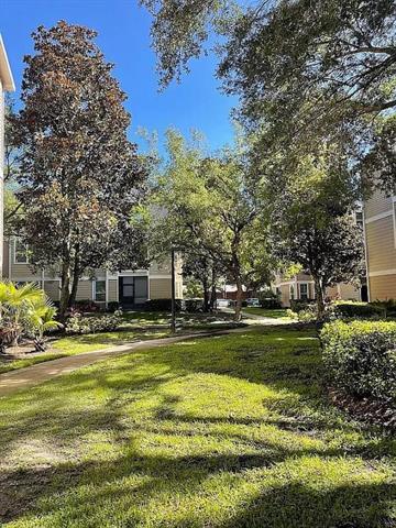 1995 Erving Cir, Unit 104 in Ocoee, FL - Foto de edificio