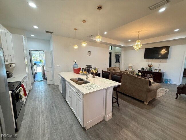 1407 Eighth Ave in Lehigh Acres, FL - Building Photo - Building Photo