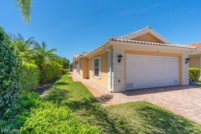 7640 Rozzini Ln in Naples, FL - Building Photo - Building Photo