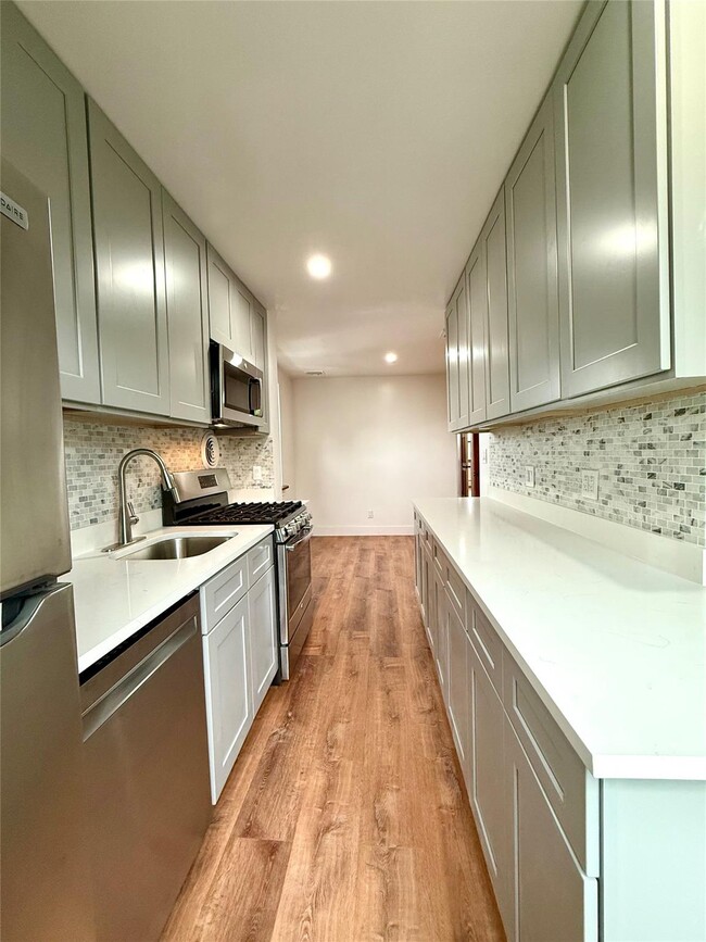 property at 60-66-66 75th St