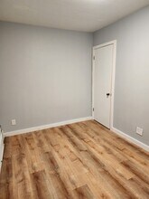 115 E Elm Ave, Unit F1 in Monroe, MI - Foto de edificio - Building Photo