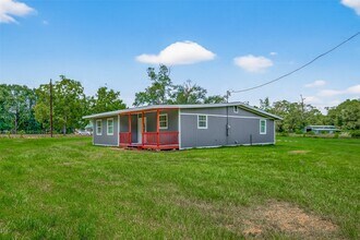 22611 Morgan Cemetery Rd in Cleveland, TX - Building Photo - Building Photo
