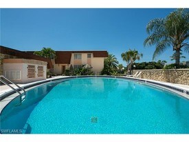 457 Tallwood St, Unit 106 in Marco Island, FL - Building Photo