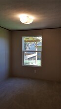104 Young St in Willis, TX - Building Photo - Building Photo