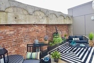 121 Portland St, Unit 708 in Boston, MA - Building Photo - Building Photo