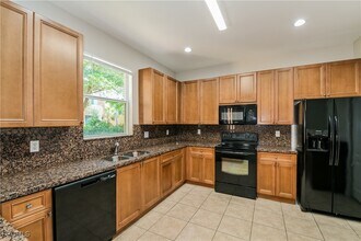 10120 N Golden Elm Dr in Estero, FL - Building Photo - Building Photo