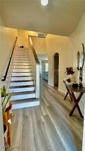 9813 Foxhall Way in Estero, FL - Foto de edificio - Building Photo