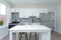 The Suites at 115 E Eager photo'