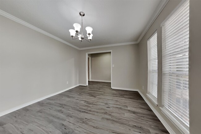 property at 5402 Woodville Ln