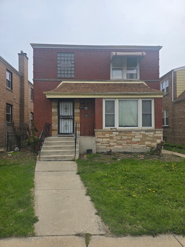 property at 8851 S Blackstone Ave