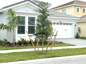 13940 Prickly Cone Cove in Westlake, FL - Building Photo - Building Photo