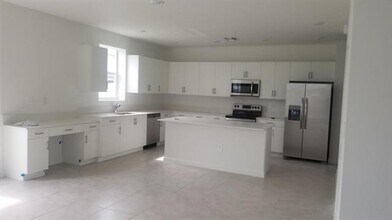 12736 SW 211th St in Quail Heights, FL - Building Photo - Building Photo