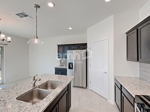 6869 E Via Arroyo Largo in Tucson, AZ - Building Photo - Building Photo