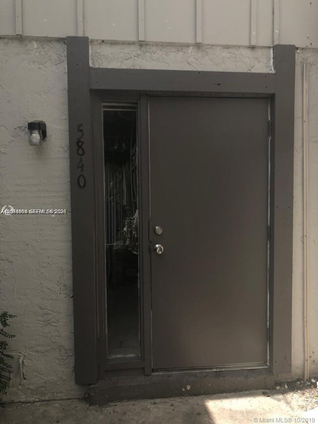 property at 5840 NW 21st St