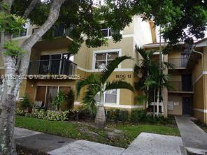 8781 Wiles Rd in Coral Springs, FL - Building Photo